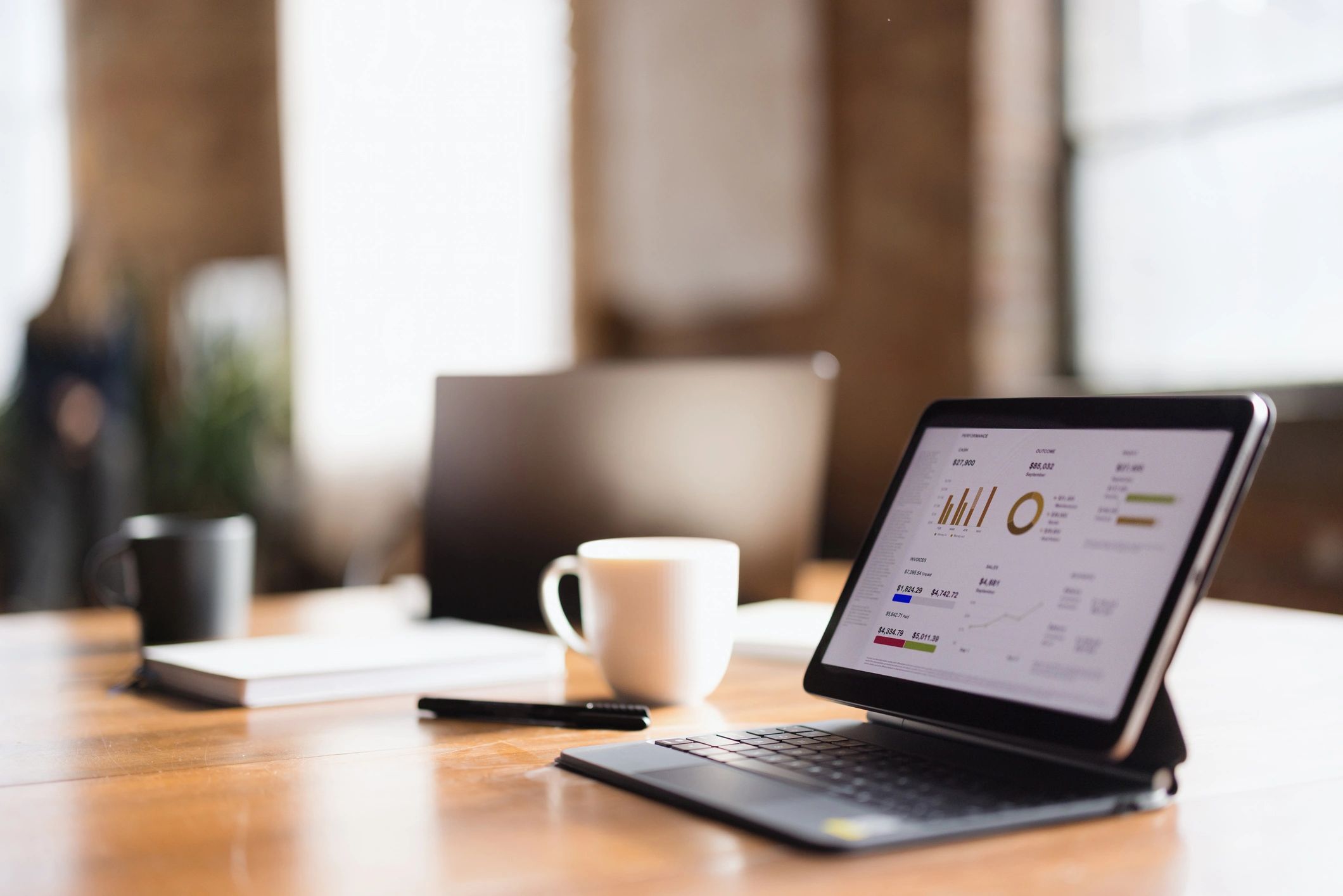 Business chart on tablet representing document refinement